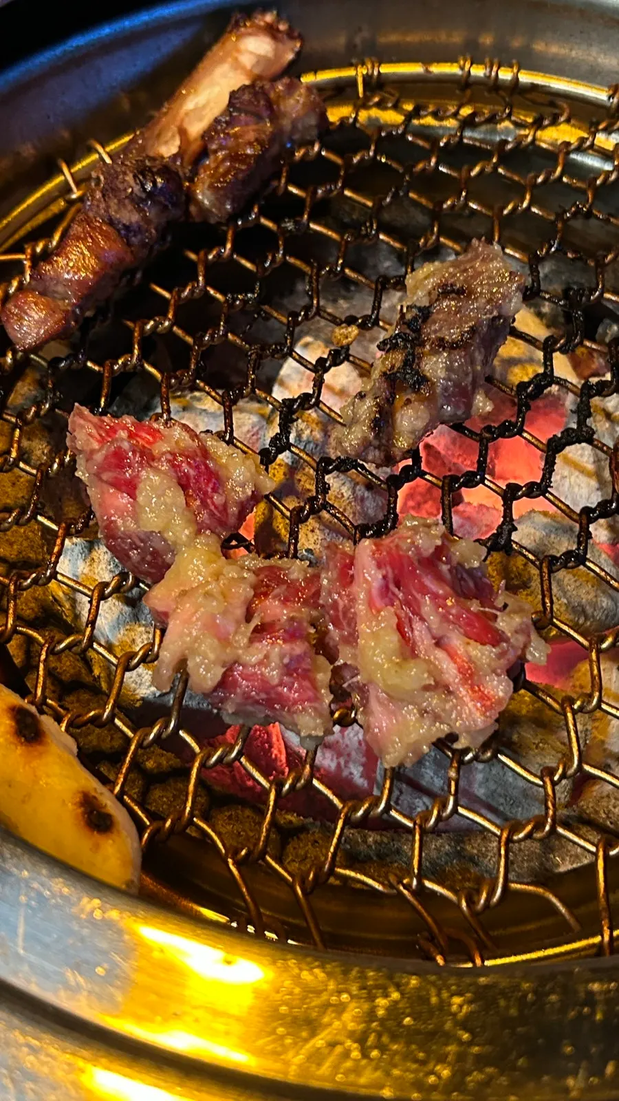 Yangnyeom galbi grilling with soy-based glaze