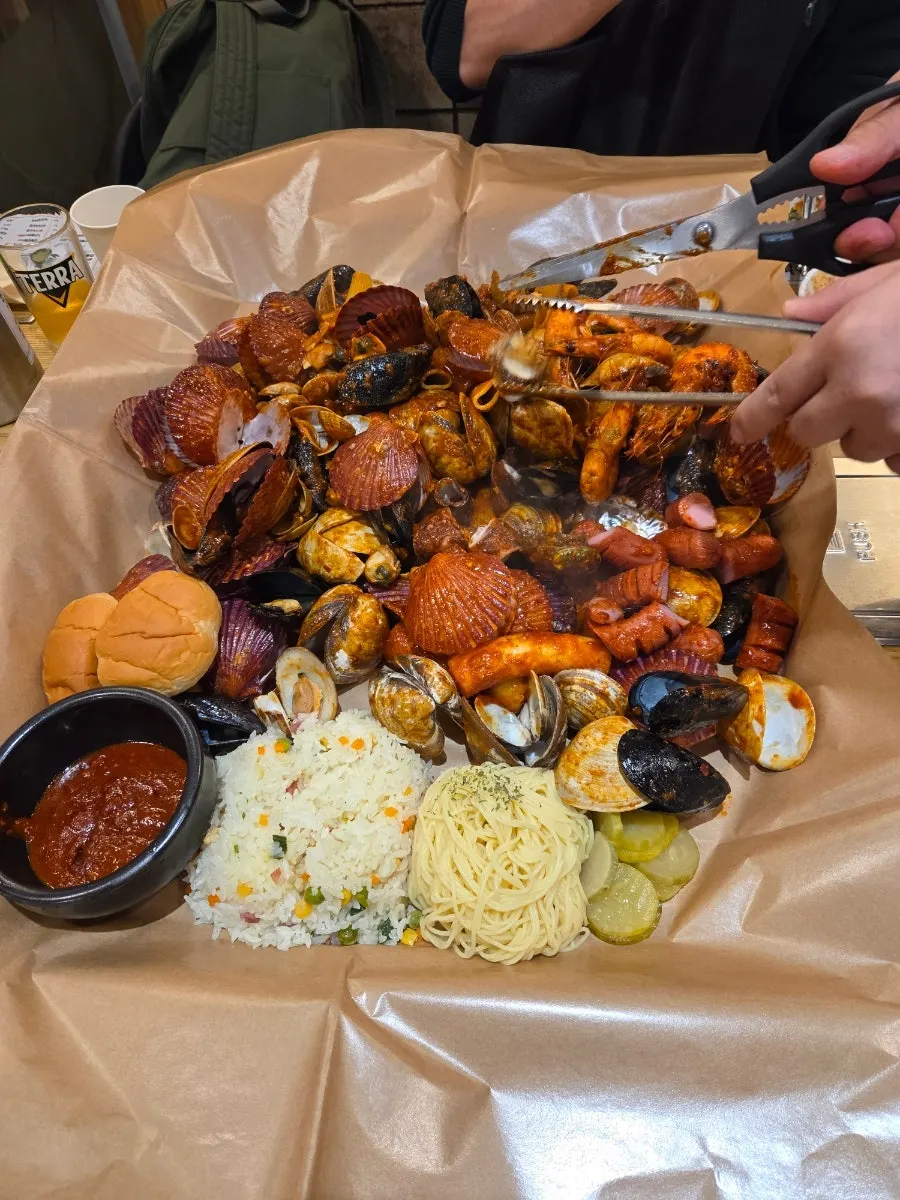 Table spread of the seafood boil at Gaetbeol-ui Jogae Yeouido Main Branch near National Assembly Station