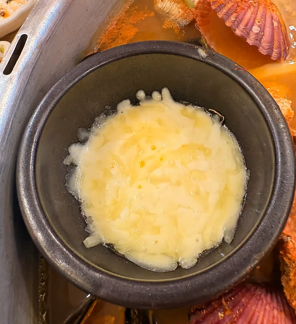 A plate piled high with fished-out clams