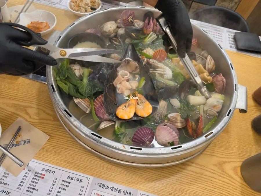 Large clam prepped by staff