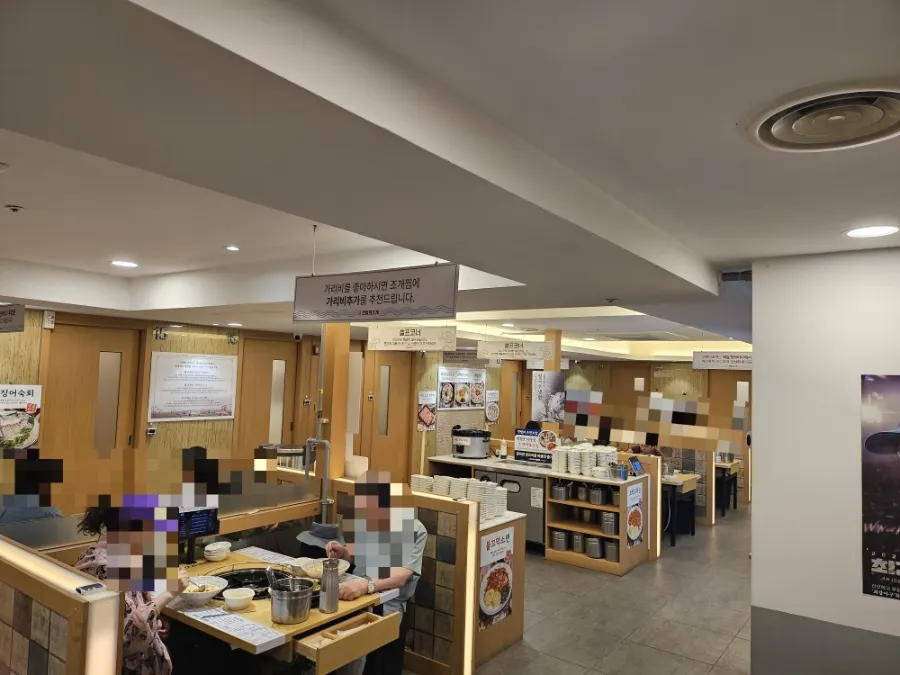 Restaurant interior with main dining seats and private rooms