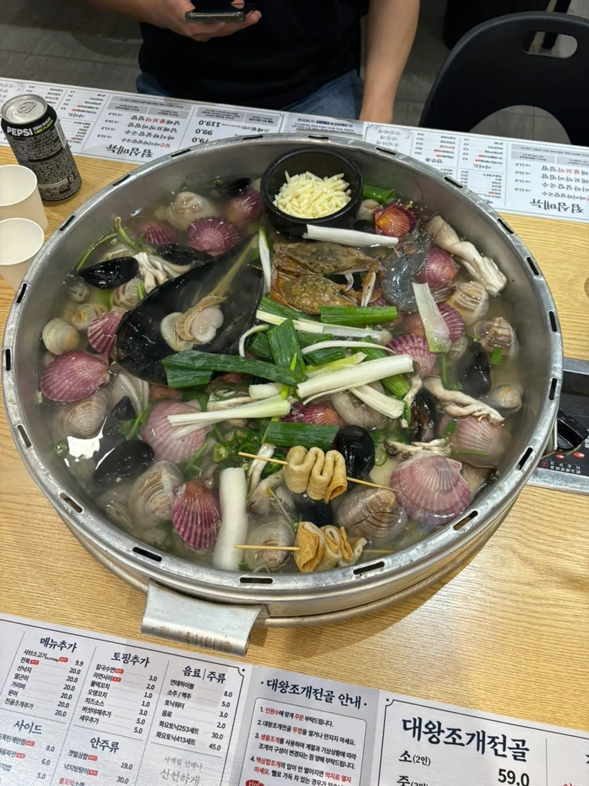 Giant clam hot pot and mini seafood pancake