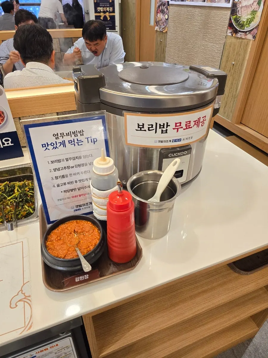 Self-bar with yeolmu kimchi and barley rice