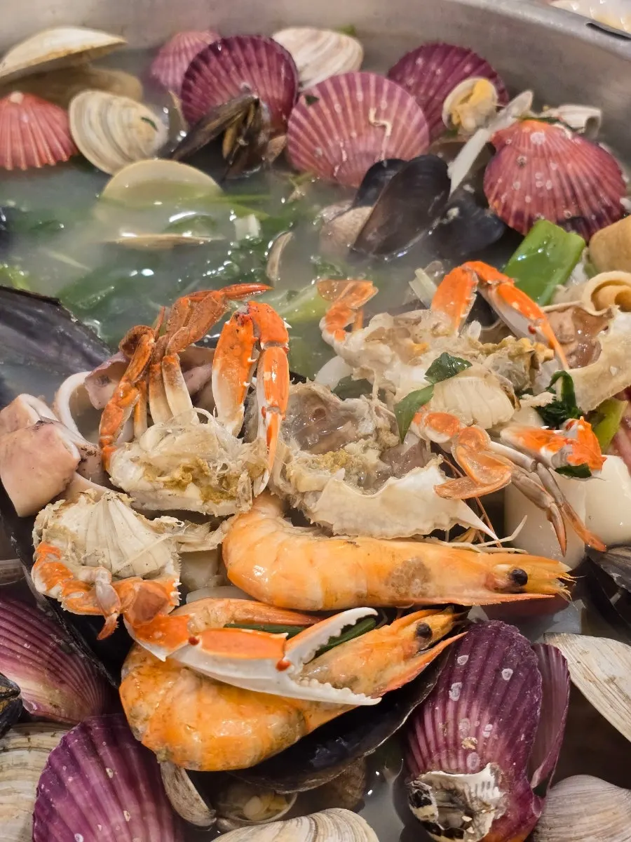 Prepared seafood placed on a pen shell