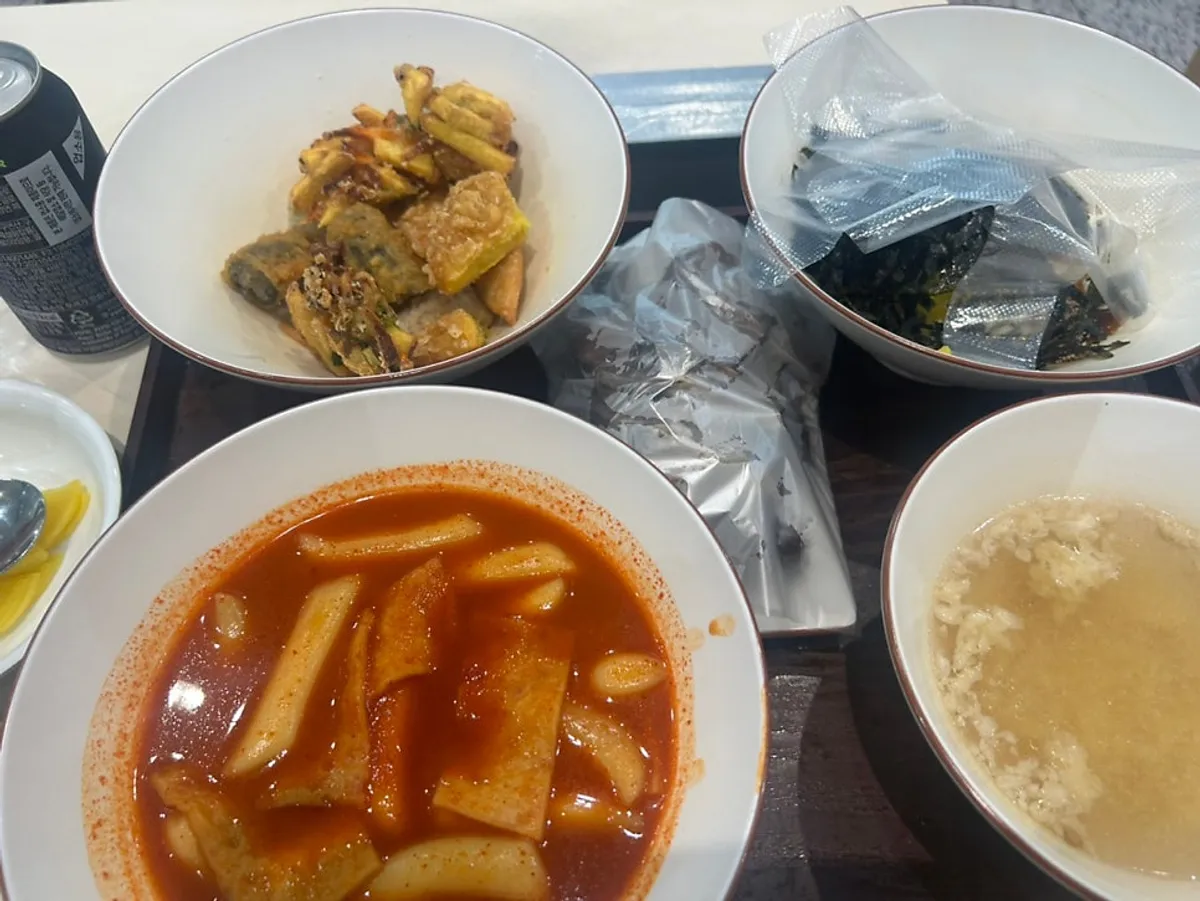 The Hyeonseonine set with tteokbokki, fried snacks, and sundae