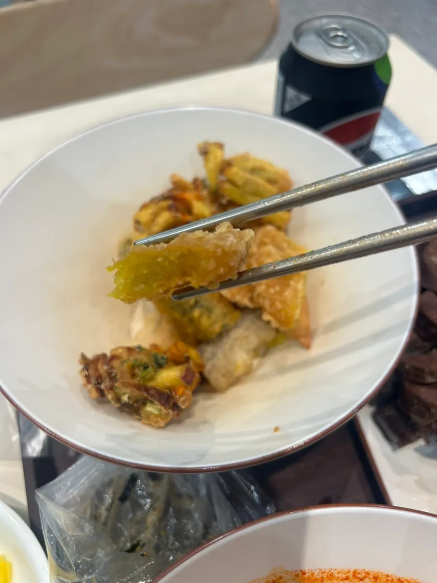Spicy broth and the full snack spread