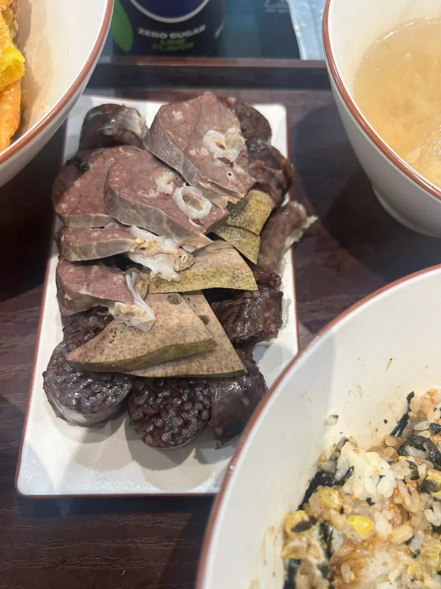 Mixed fried snacks with kimmari, dumplings, sweet potato, and vegetables