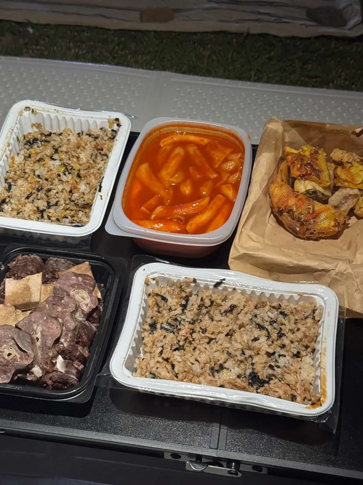 Hyeonseoni Set and tuna mayo rice bowl laid out at Han River Park