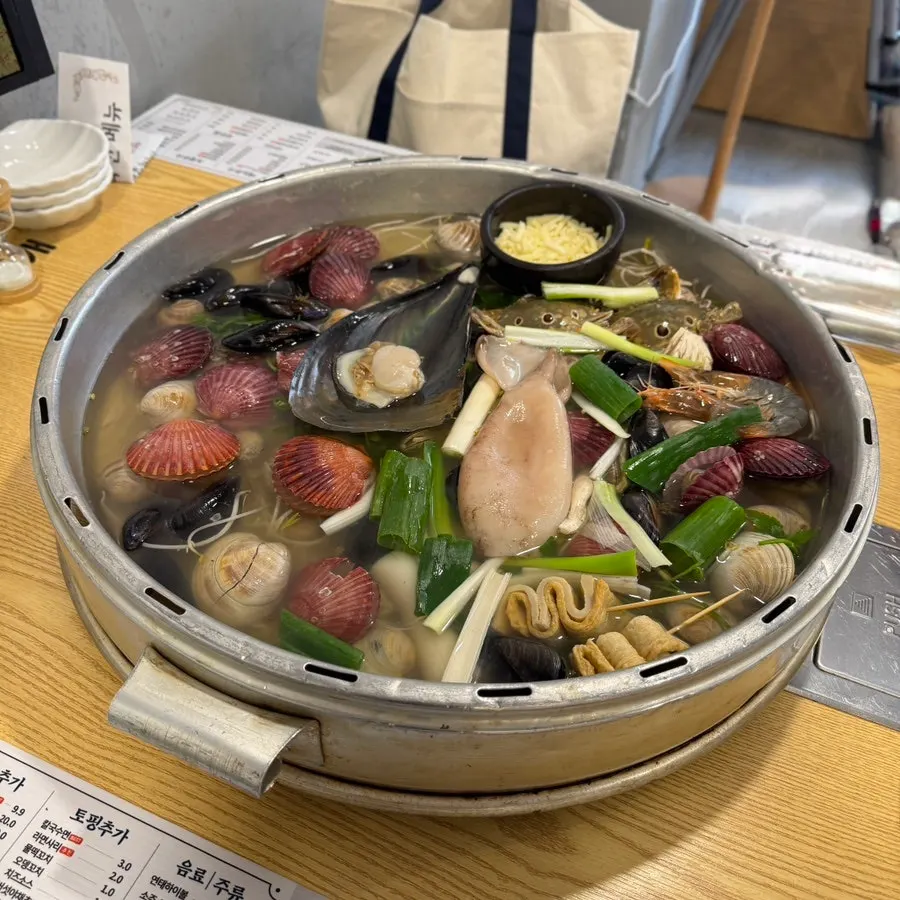 A bowl of yeolmu bibimbap mixed to taste