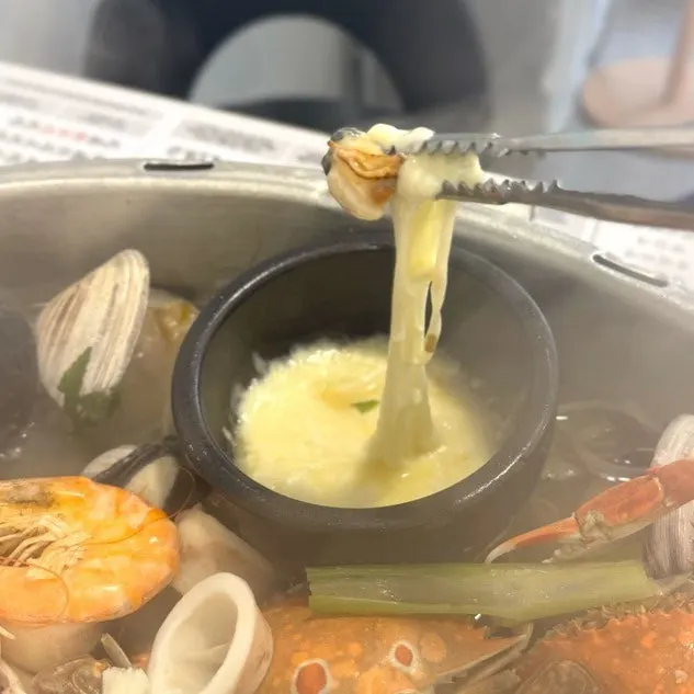 Cheese fondue served alongside