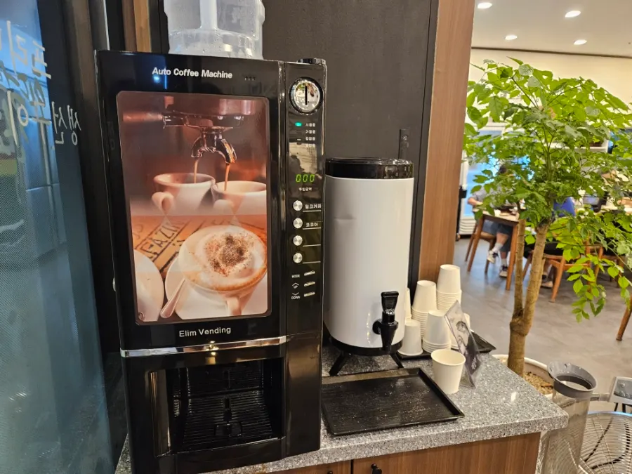Coffee machine near the store exit