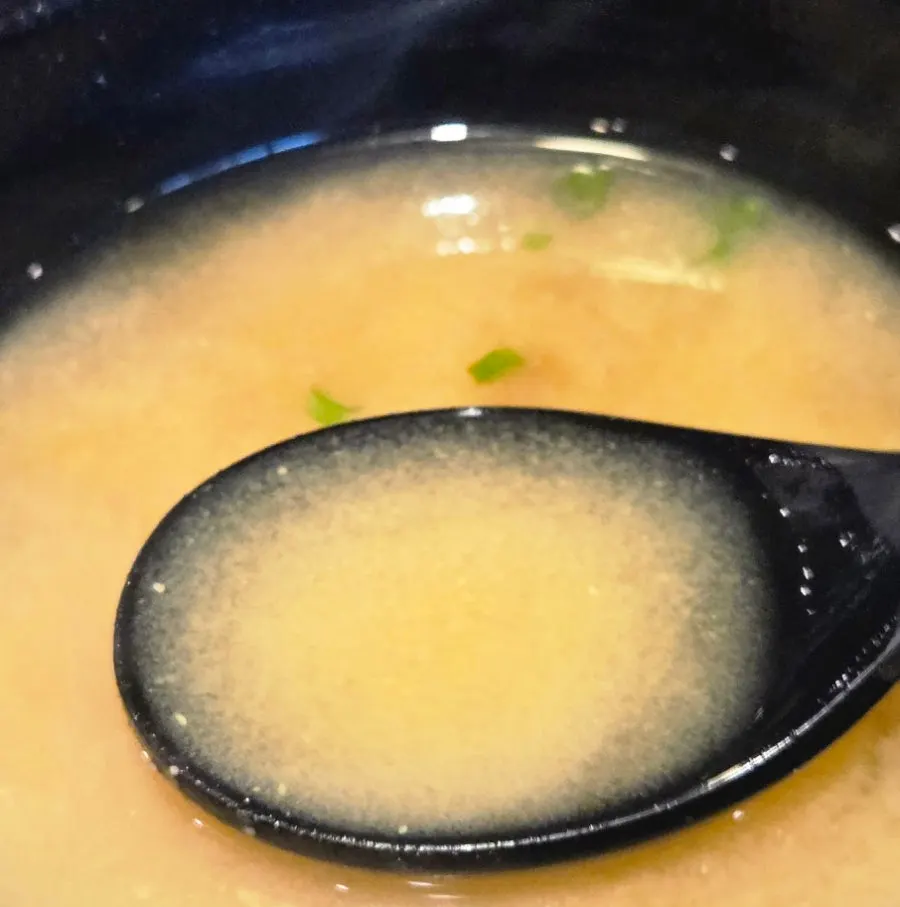 A piece of gyukatsu dipped in salt