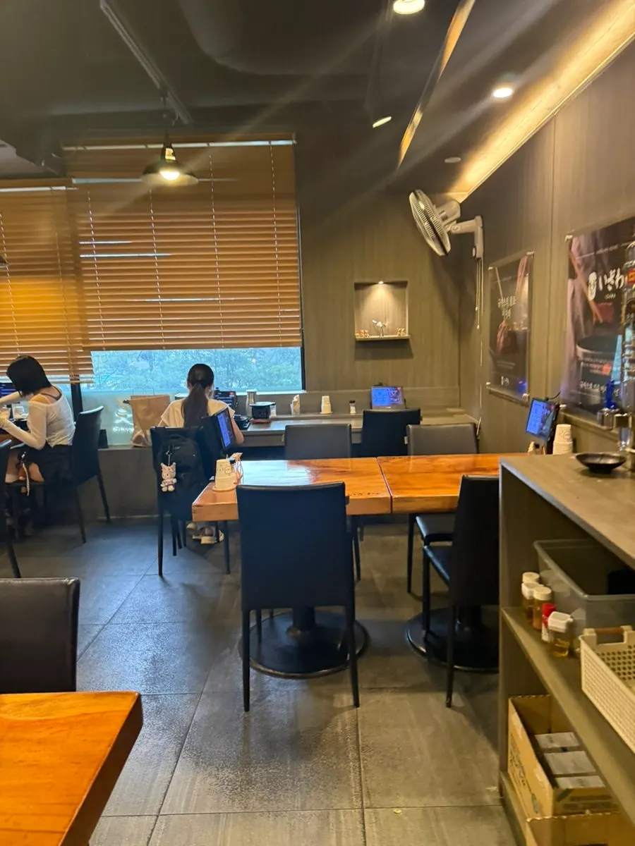 Interior seating at Izawa Yeouido Direct Store