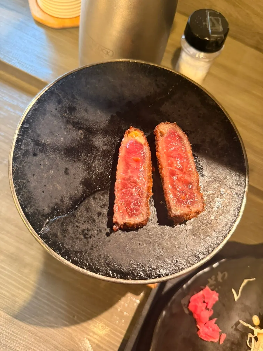 Gyukatsu placed on the mini charcoal grill