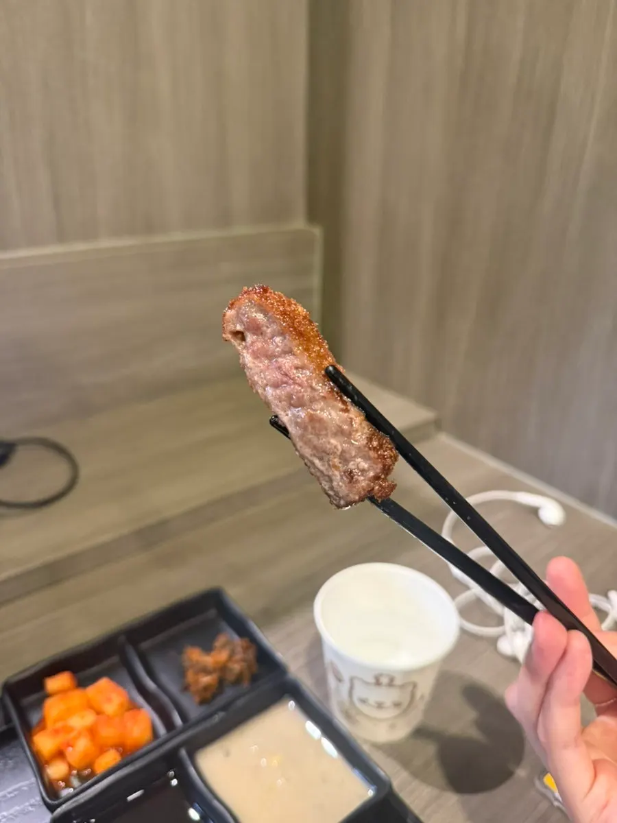 Juices dripping from grilled gyukatsu