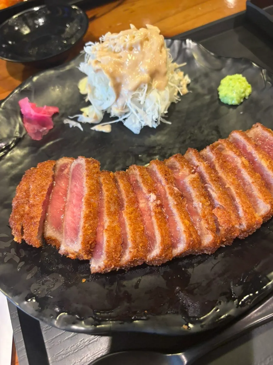 Sirloin gyukatsu cooking on the brazier