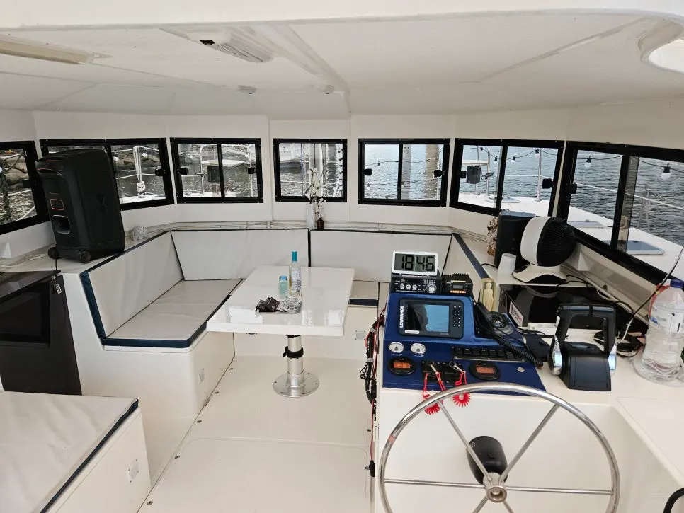 Exterior of the white-toned private yacht boarded for the tour