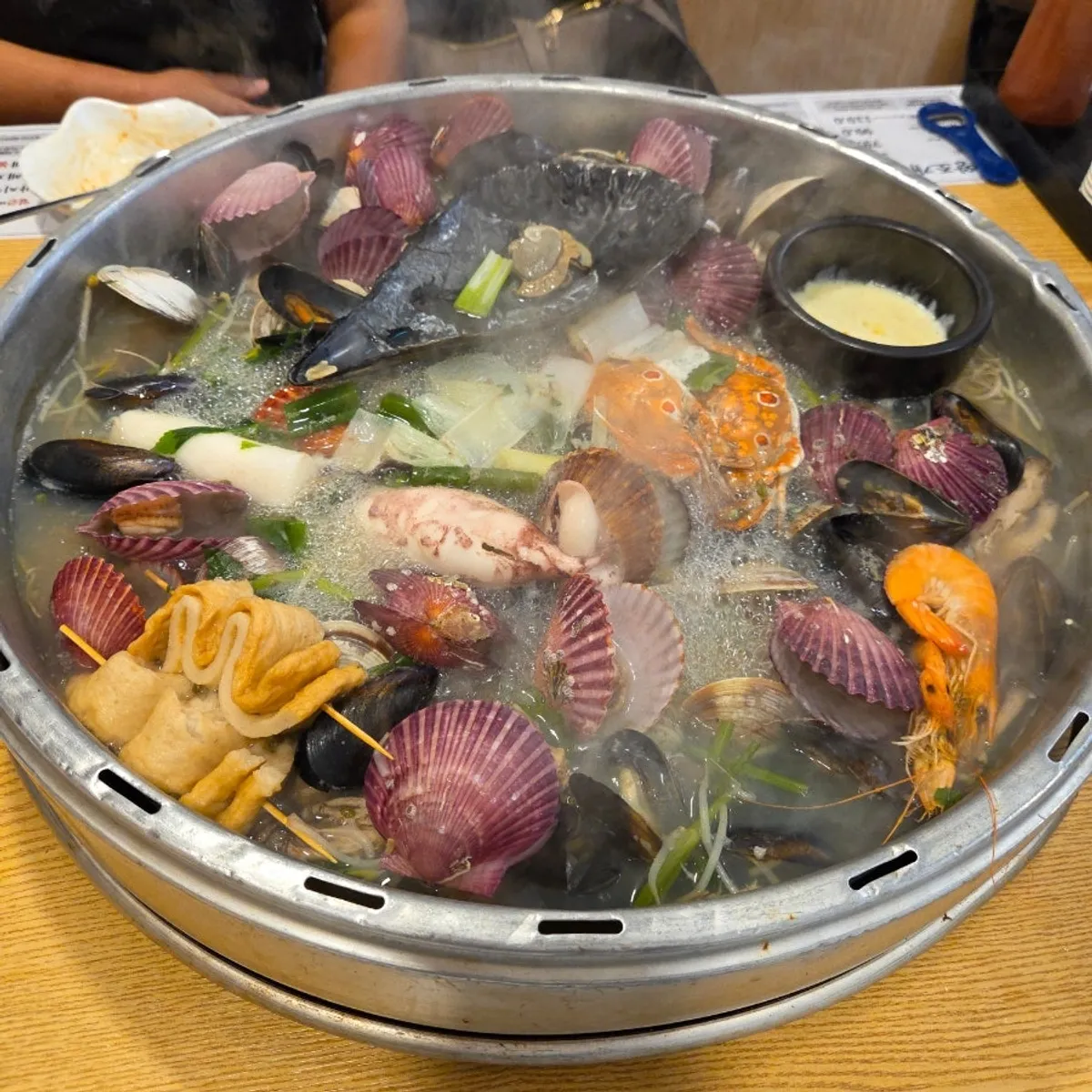 Finished giant clam hot pot for two