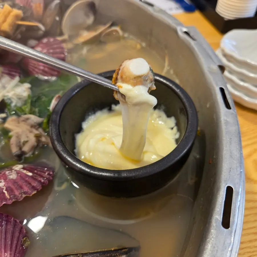 Seafood served with cheese