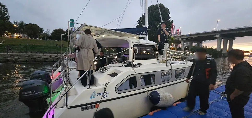 A Han River bridge and the Seoul skyline seen from the yacht