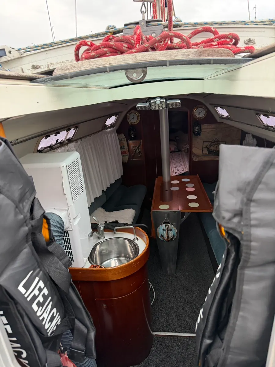 Cozy relaxation space below the yacht stairs