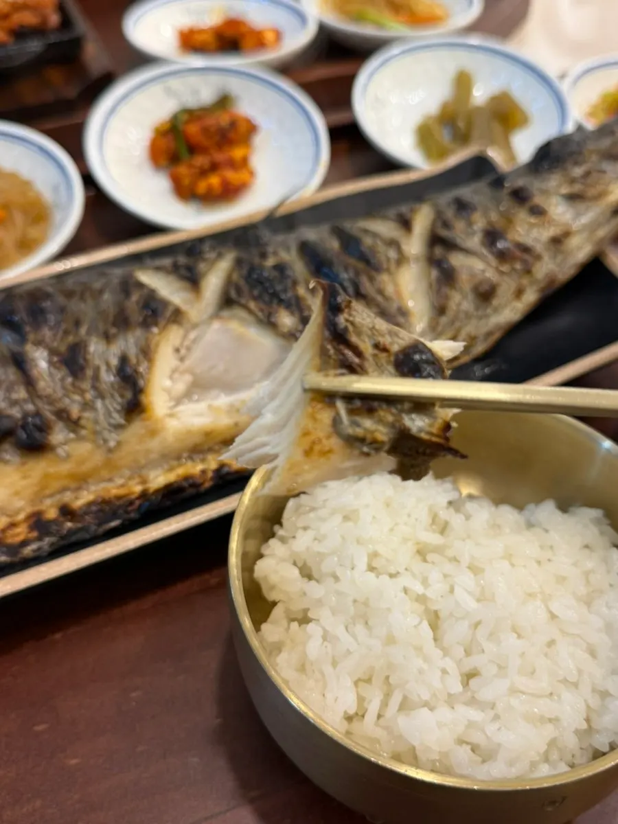 Golden-grilled surface of the mackerel