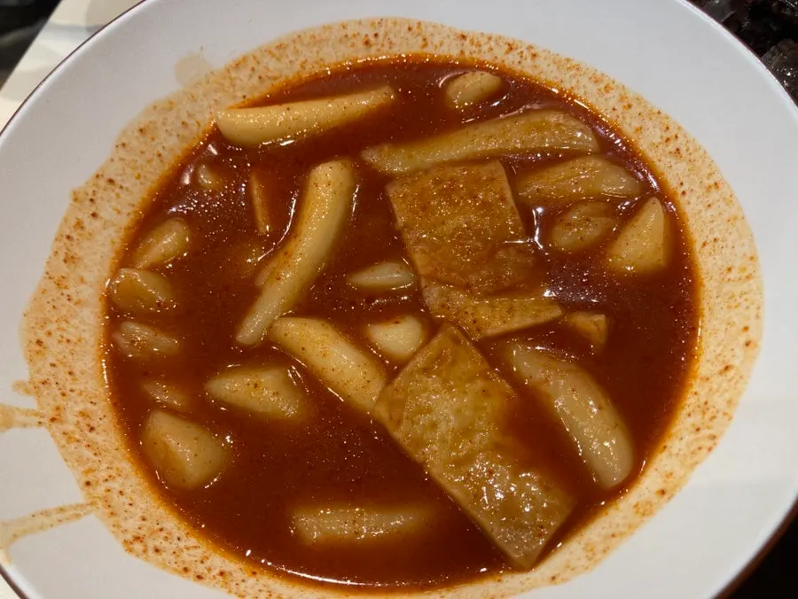 Hyeonseonine set with tteokbokki, sundae, fried snacks and mini gimbap