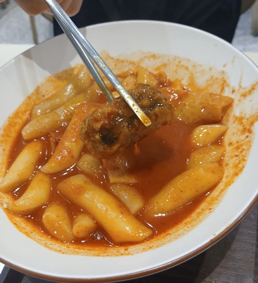 Tteokbokki coated in sweet-and-spicy sauce