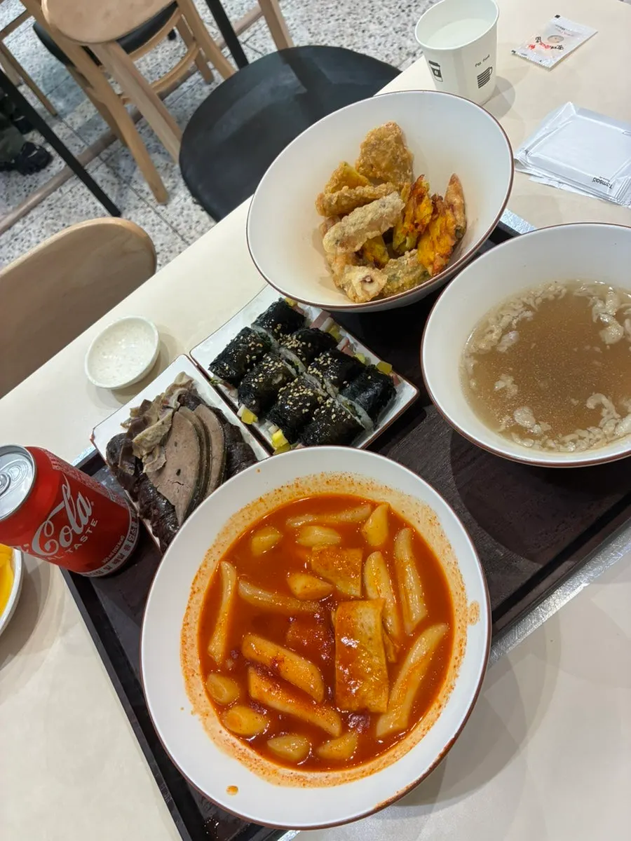 Chewy rice cakes coated in tteokbokki sauce