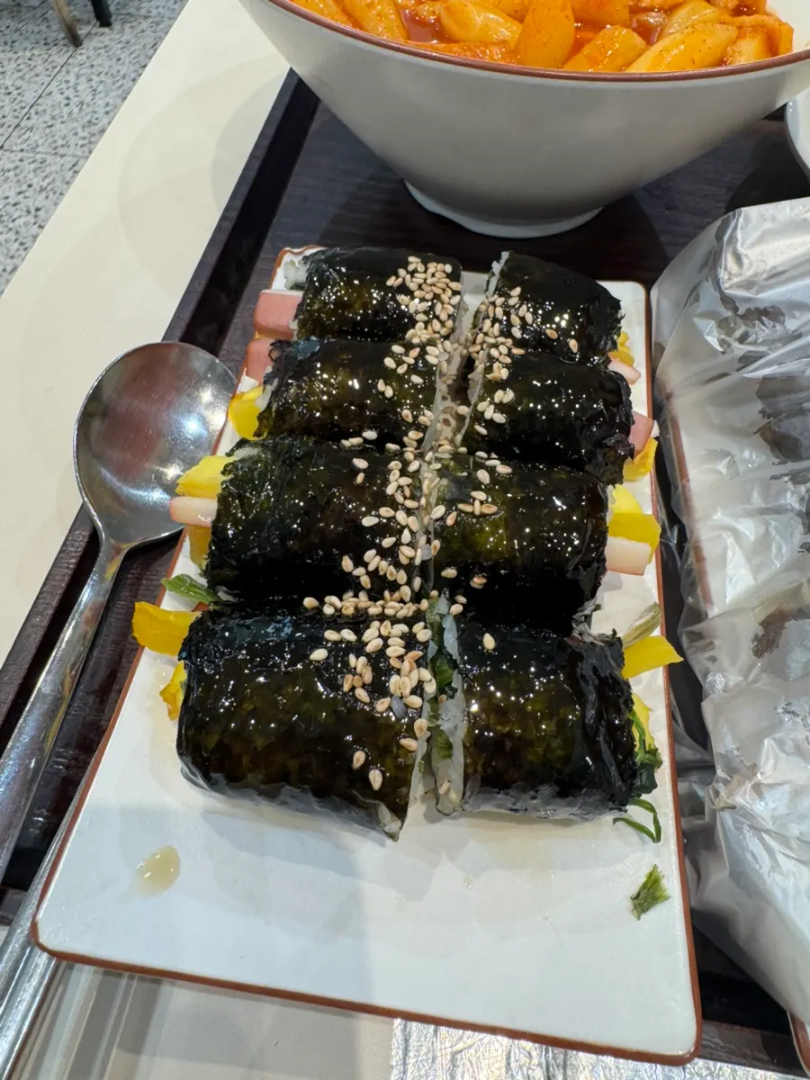 A plate of sesame-topped gimbap