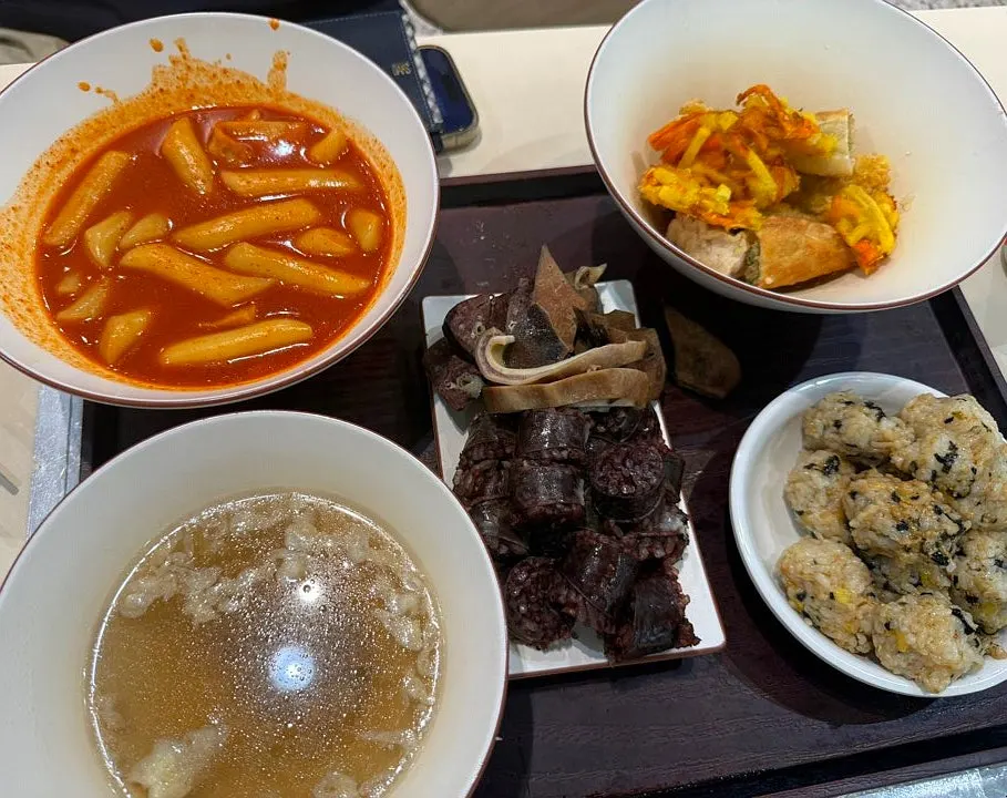Full spread of Hyeonseonine tteokbokki and side dishes