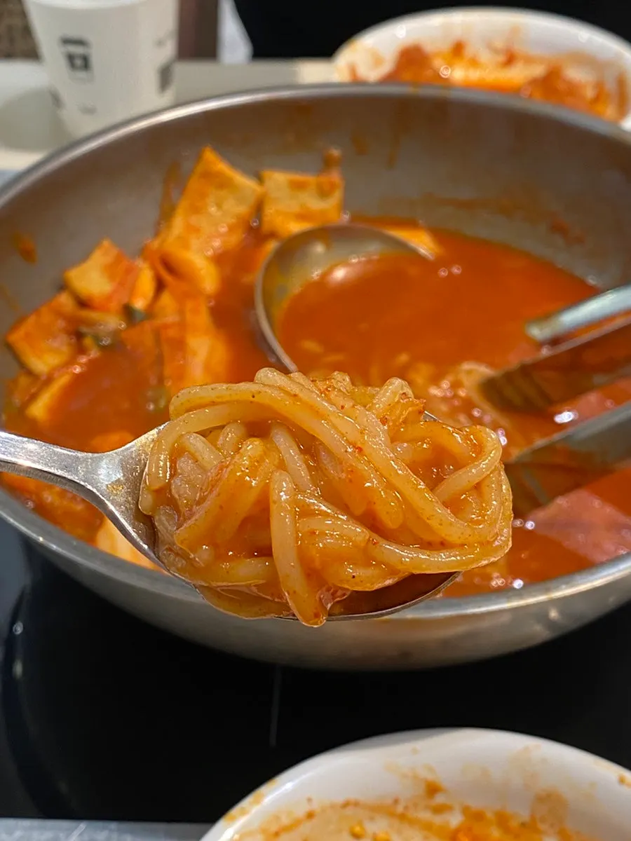 Jjolmyeon noodles mixed into the tteokbokki sauce
