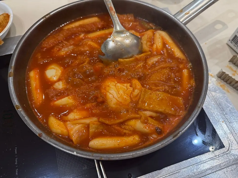 Instant tteokbokki bubbling on the table