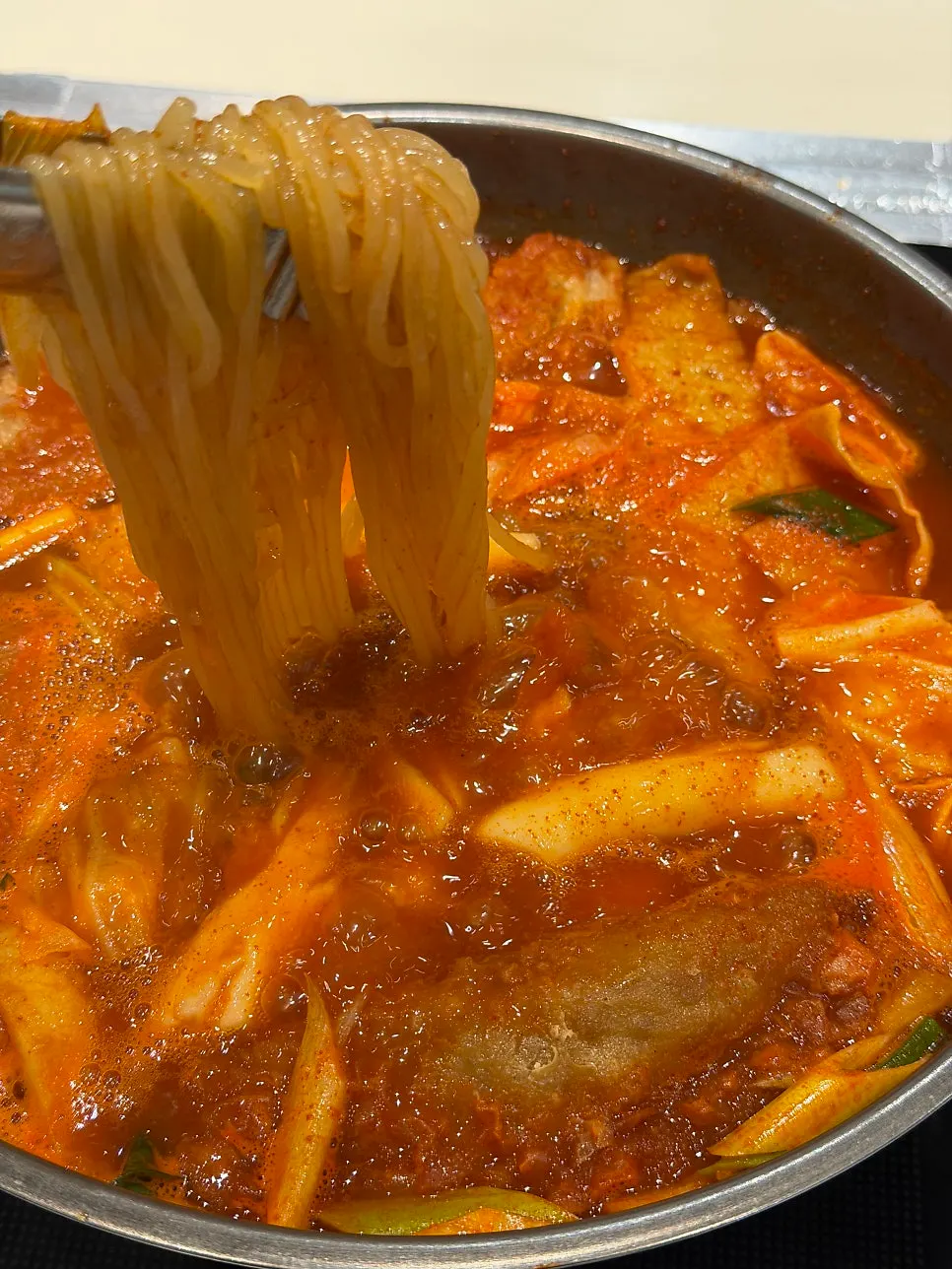 Tteokbokki and yaki-mandu served onto a plate