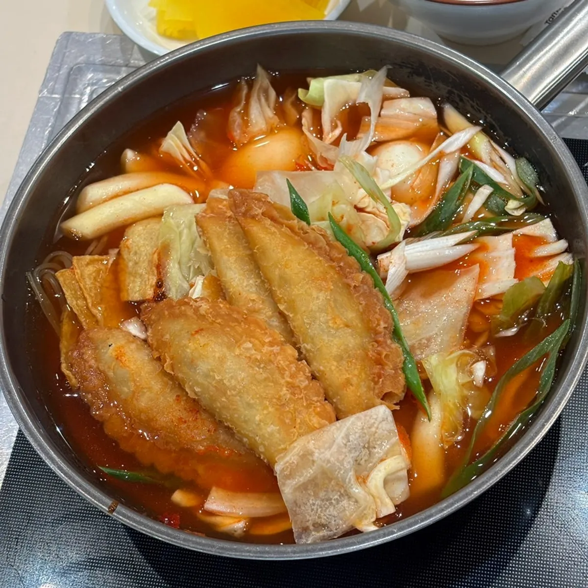 A full spread of instant tteokbokki at Hyeonseonine Premium IFC Mall Branch