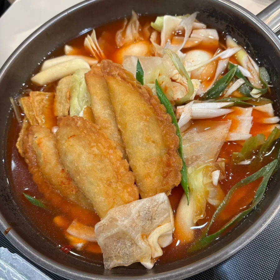 Pot of instant tteokbokki packed with ingredients