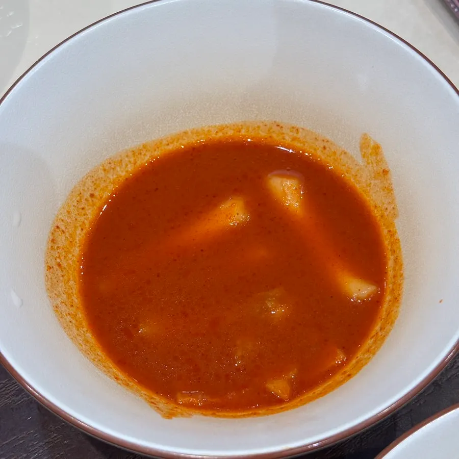 A spoonful of the chicken mayo rice bowl