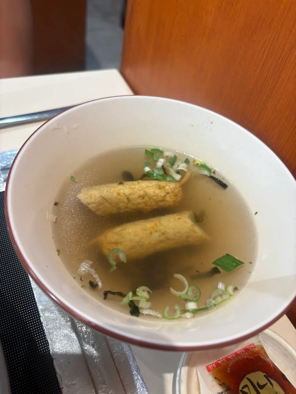 Close-up of instant tteokbokki with jjolmyeon noodles and vegetables