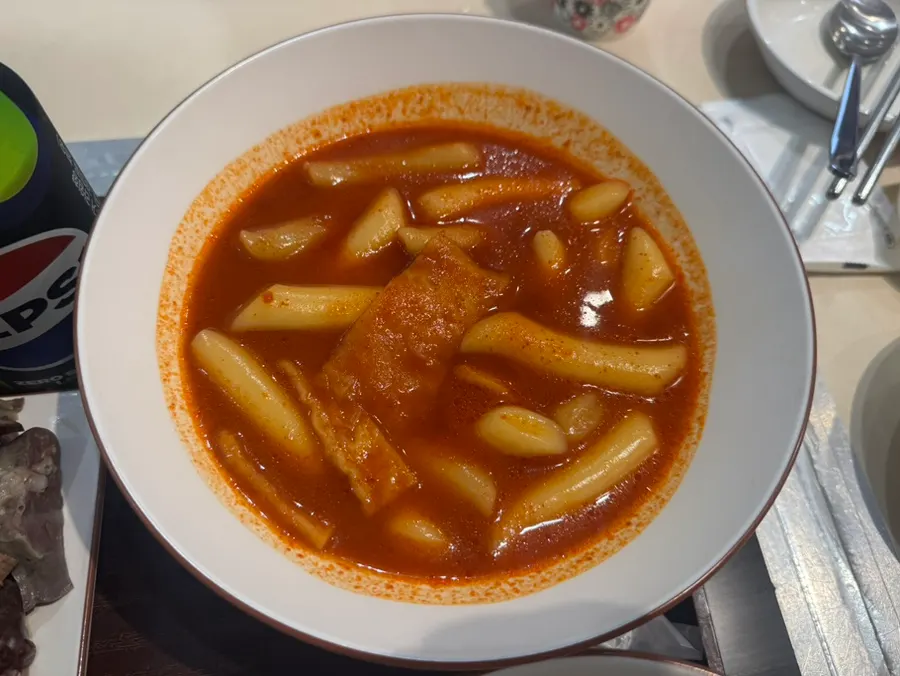 Hyeonseoni set with tteokbokki, sundae, fried snacks and rice balls