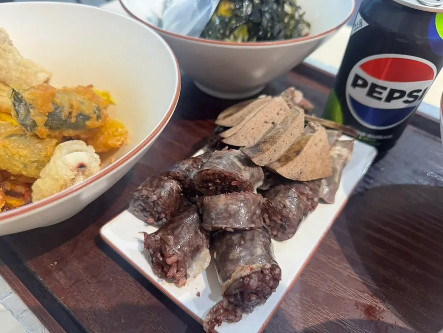 Fish cake broth served alongside the meal