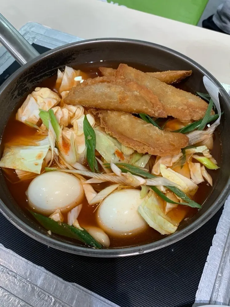Table set with the full instant tteokbokki spread