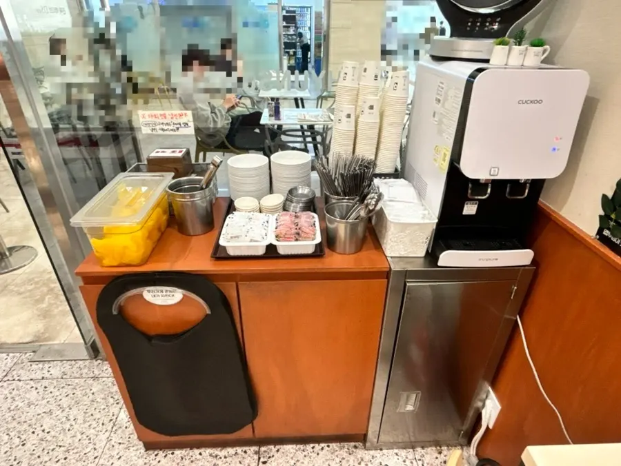 Self-serve bar with water dispenser and pickled radish