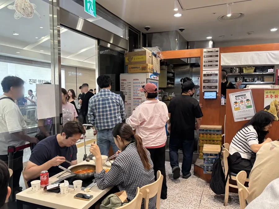 IFC Mall street shop corridor and the snack restaurant's sign
