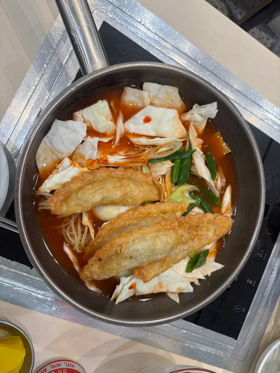 Instant tteokbokki for two boiling at the table
