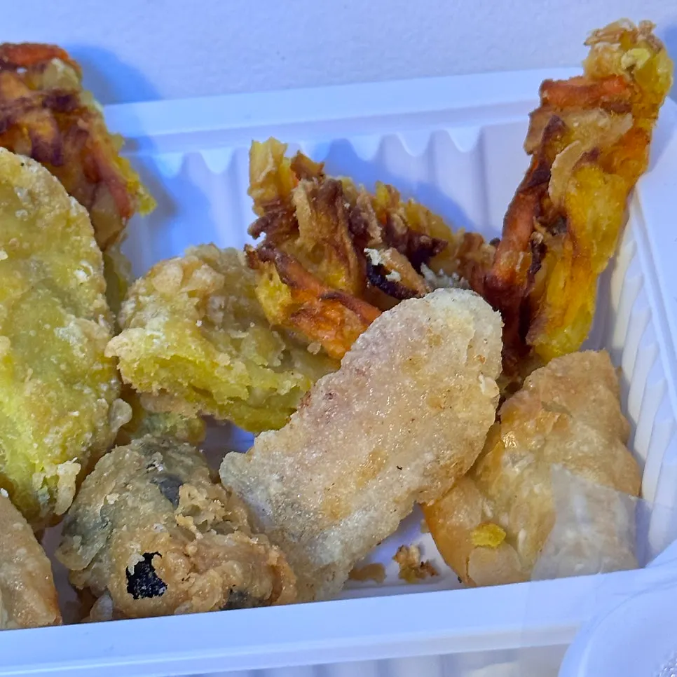 Plate of sundae and assorted fritters