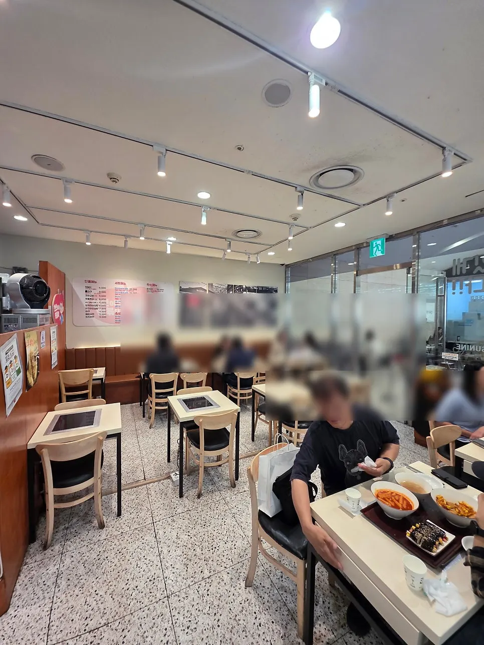 Interior of Hyeonseonine Premium IFC Mall Branch with mostly 2-person tables