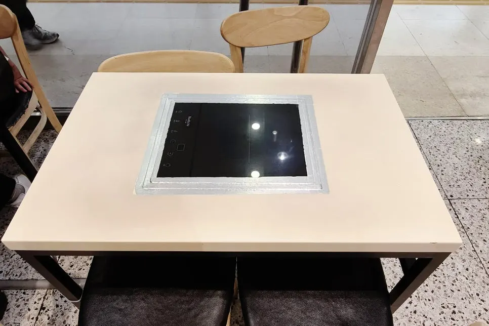Table with induction burner for instant tteokbokki