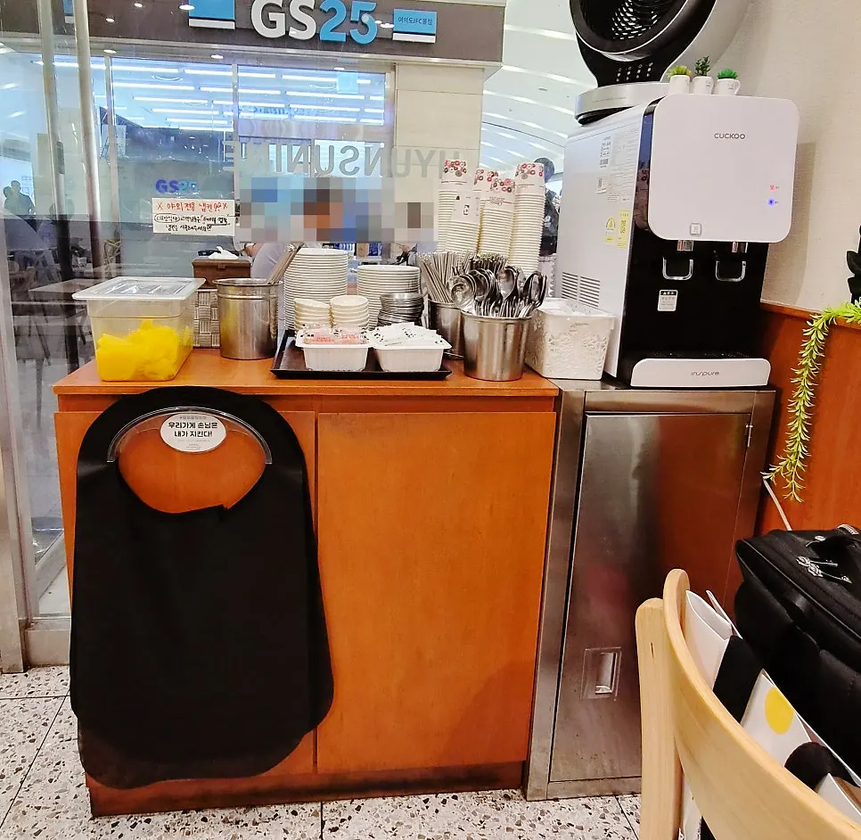 Self-serve bar with danmuji and soy sauce for fried snacks