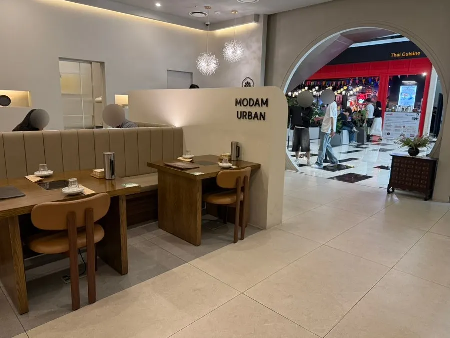 Interior tables and decor at Modam Urban