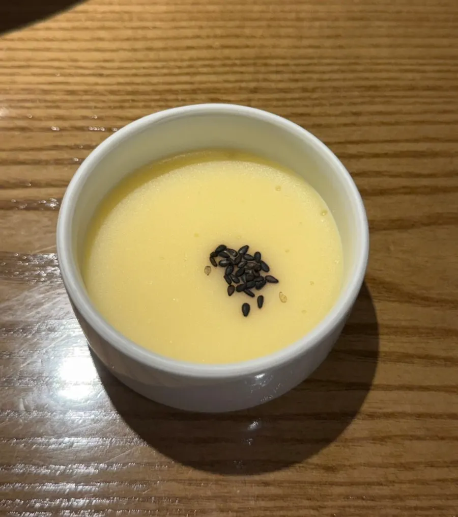 Mung bean porridge topped with black sesame